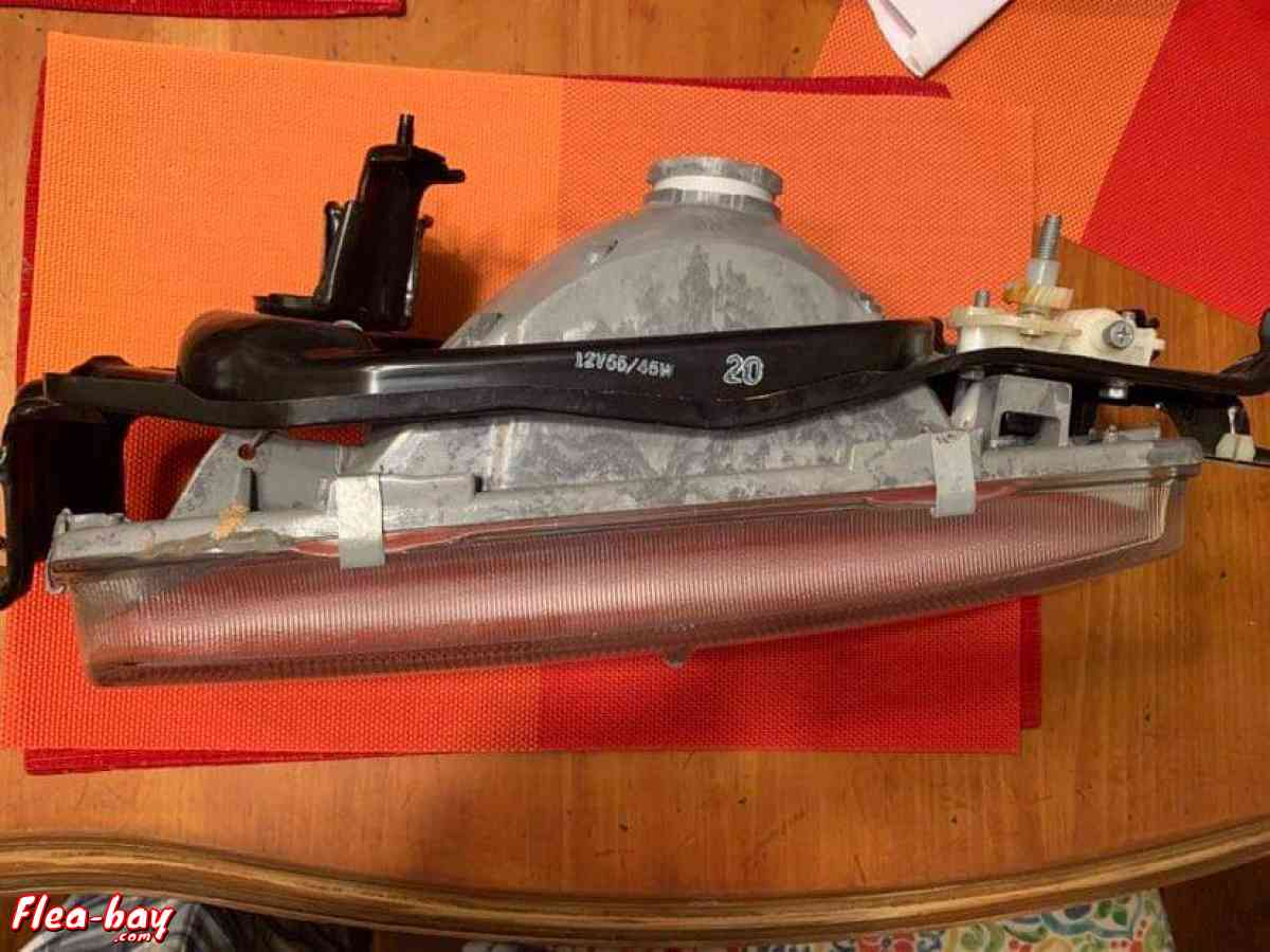 1988 left side headlight assembly