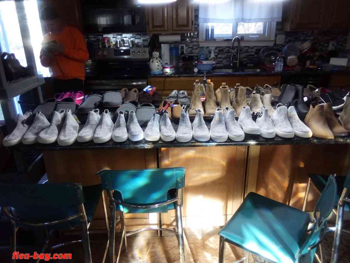 brand new shoes and slippers with price tags