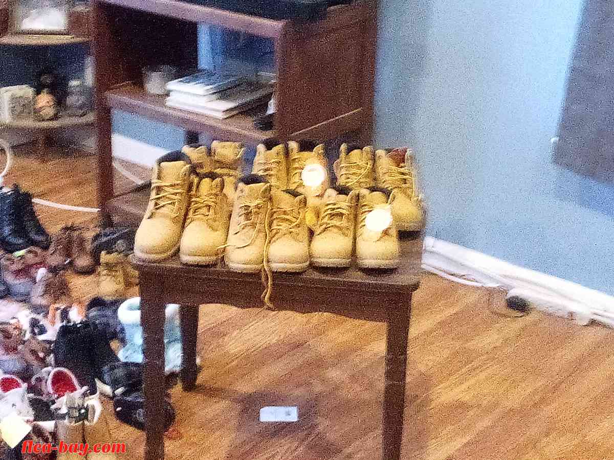 brand new shoes and slippers with price tags