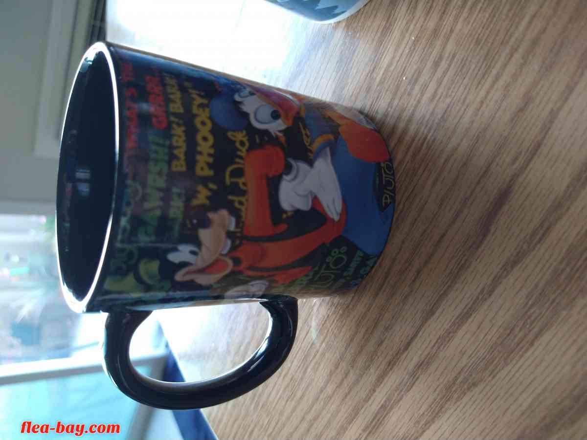 two Disney coffee cups