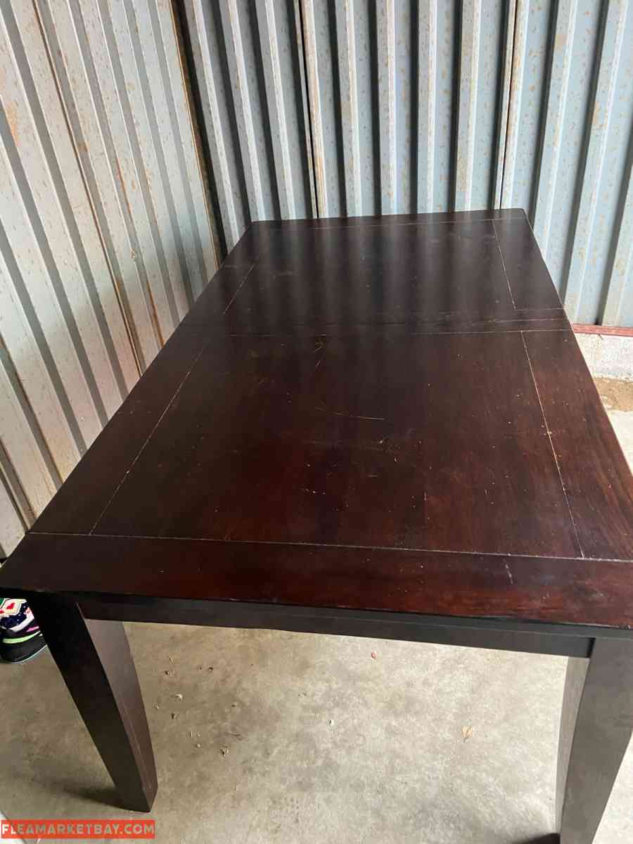 Brown Big Table with Four Chairs