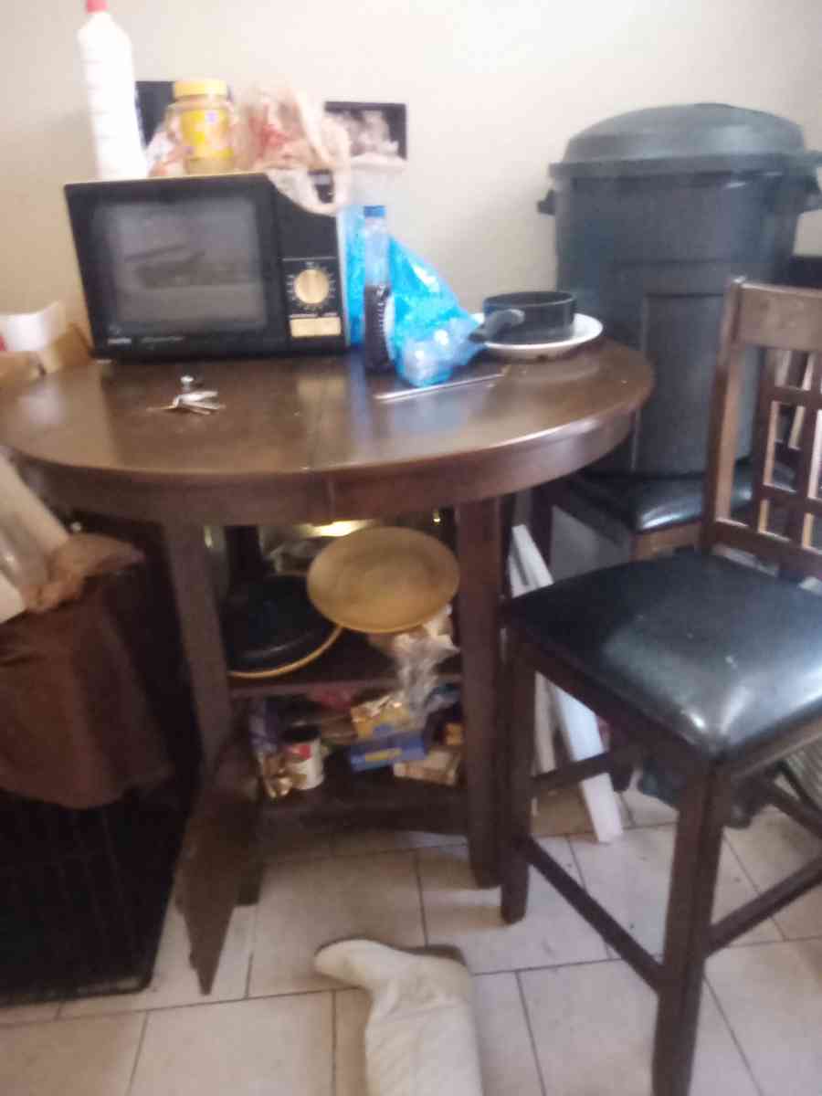 Dinning room round room table with 4 charis brown