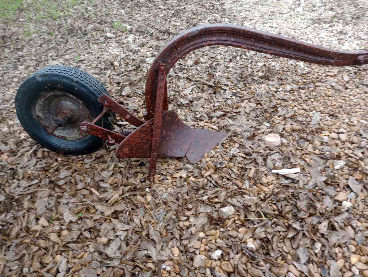 old pull behind plow