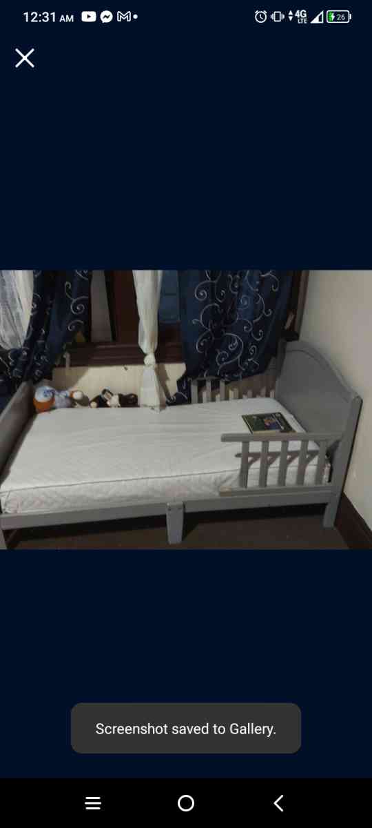 toddler bed frame with mattress.