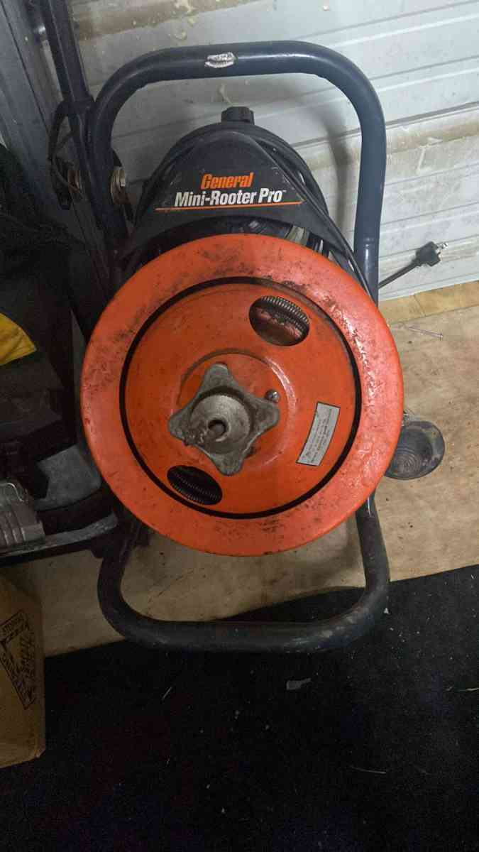 Three RotoRooter machines two small one big