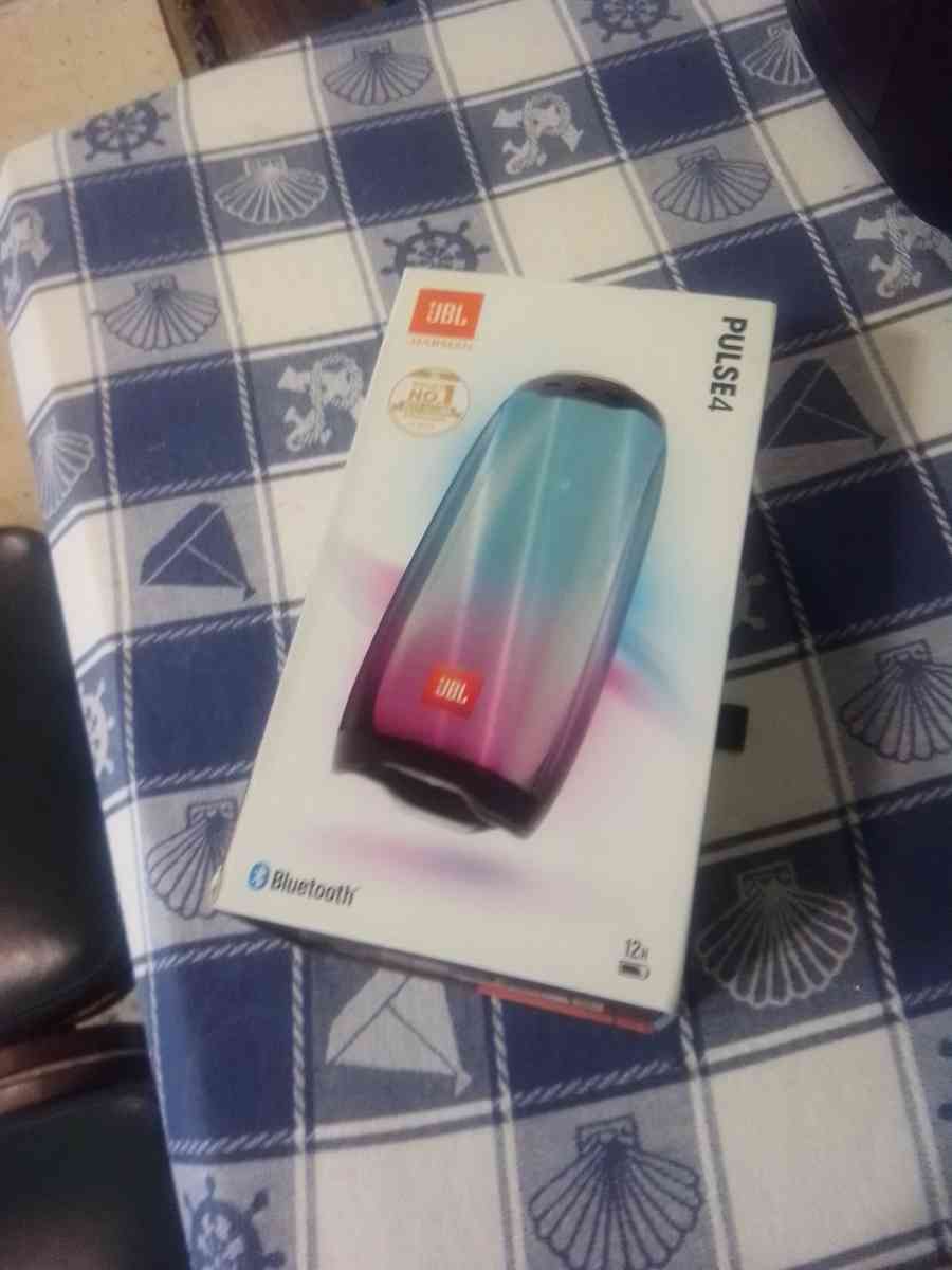 A jbl pulse 4 Bluetooth speaker and a Gateway laptop