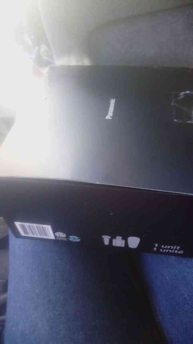 Panasonic Arc6 Shaver with self cleaning charging dock