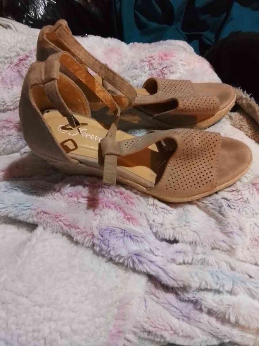 woman tan wedgevsandals