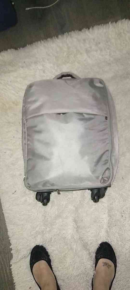 small silver suitcase