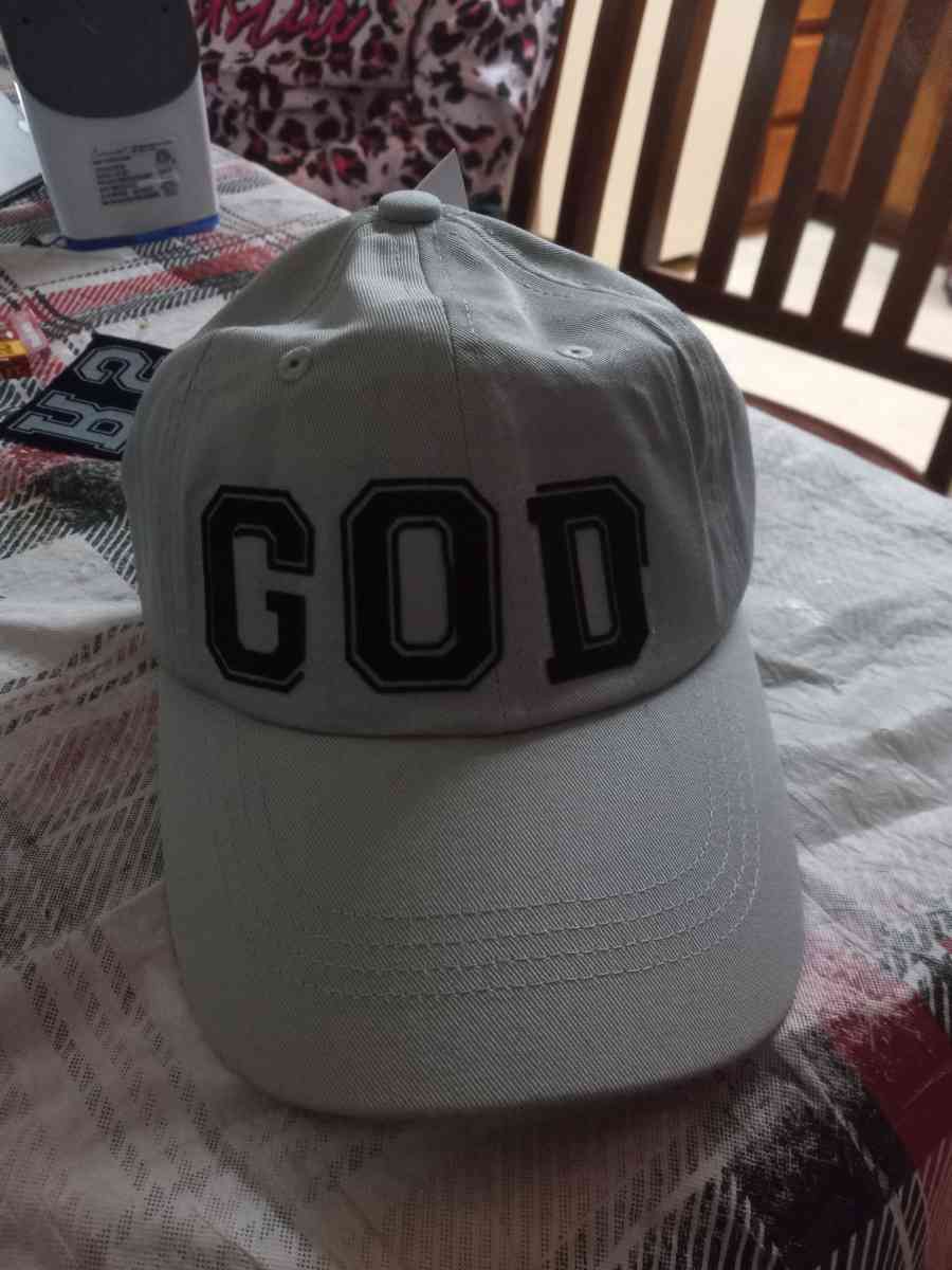 baseball cap that says God on it