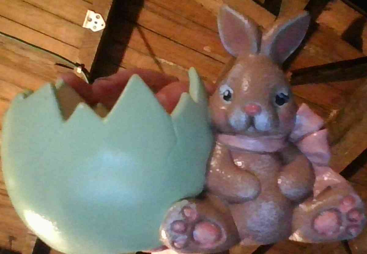 set of decorative bunnies and a half shell