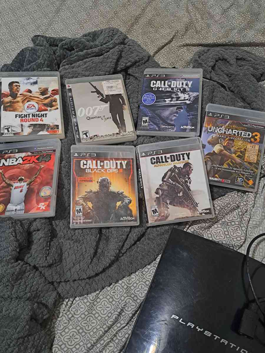 Im selling this ps3 with 7 games  without controllers