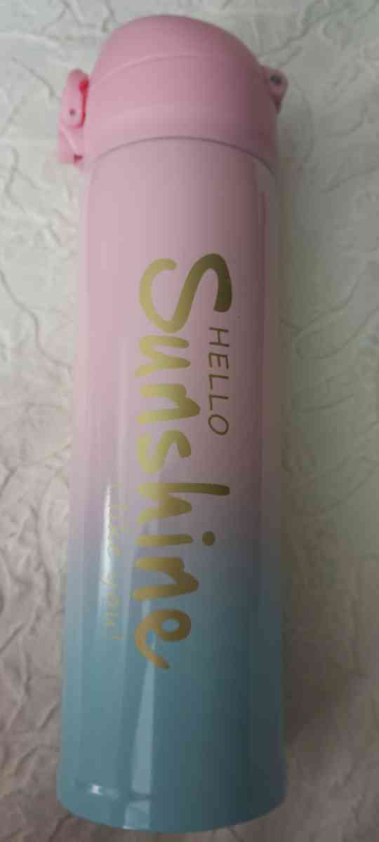 A steel drinking cup thermos