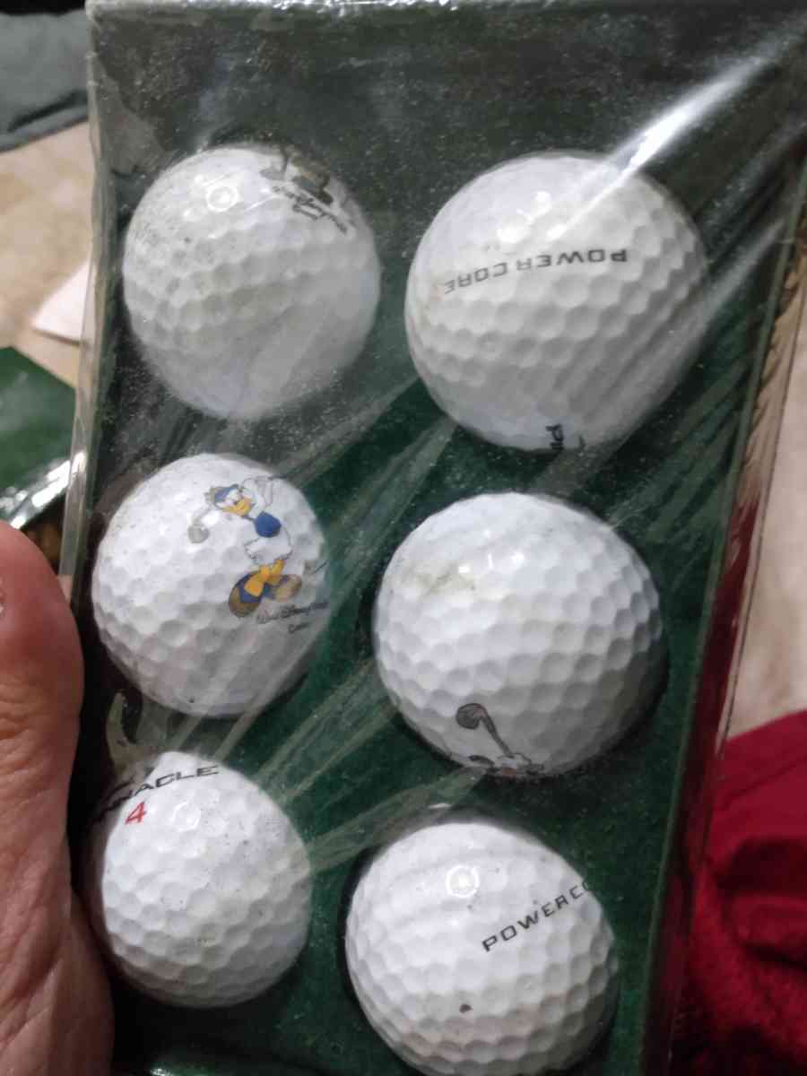 golf balls with mickey and goofy and Donald disney collectio