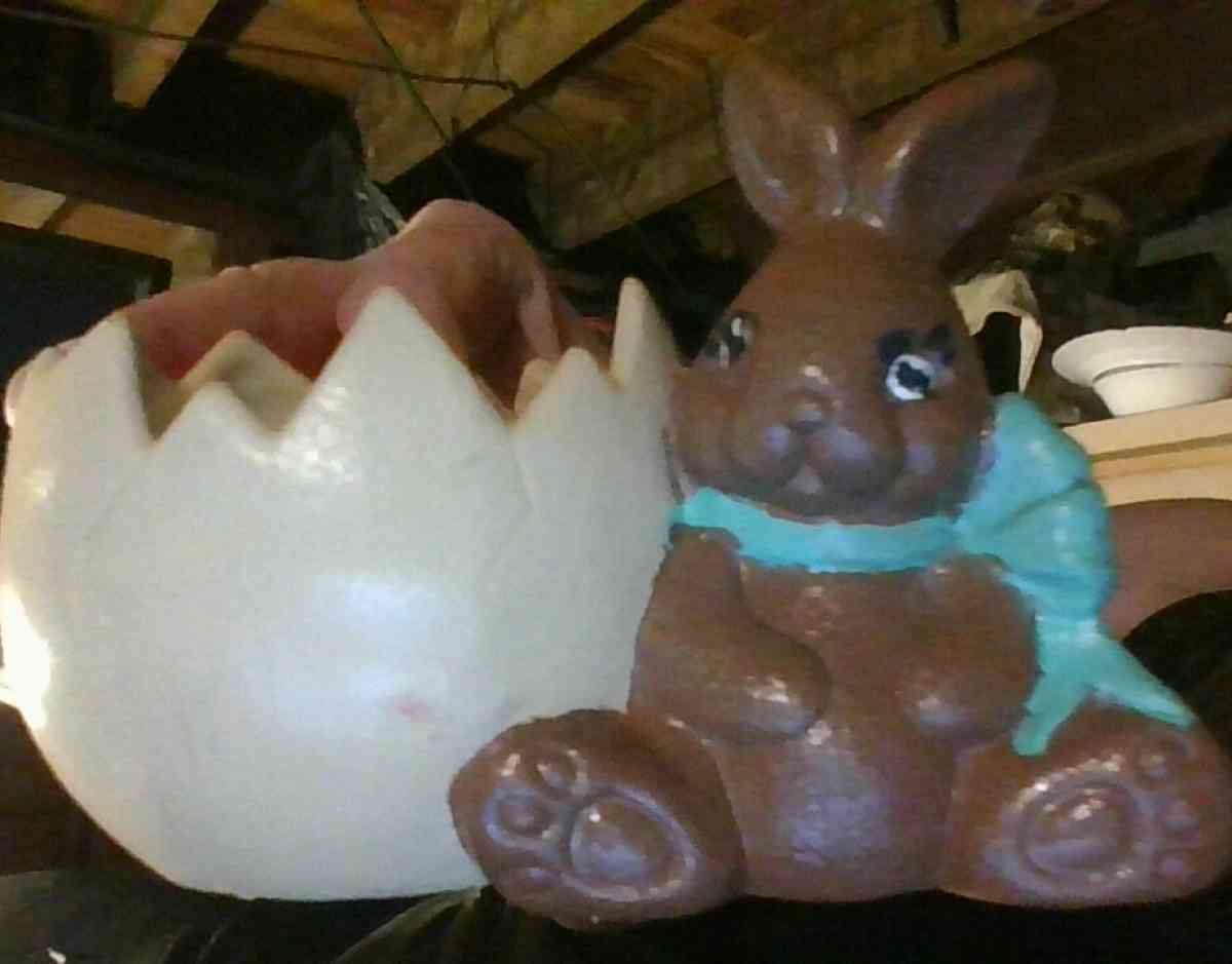 set of decorative bunnies and a half shell