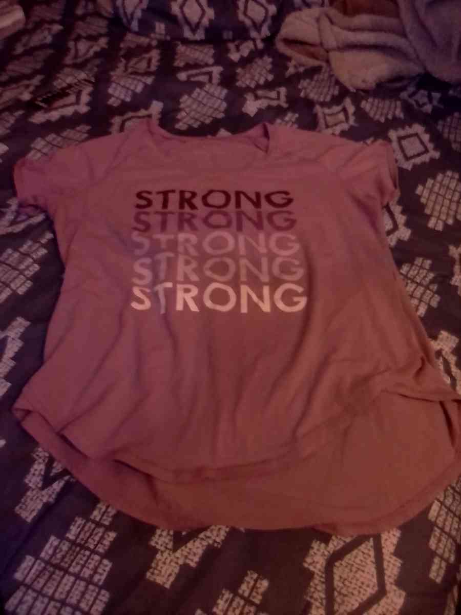Womans  tee strong size is a M