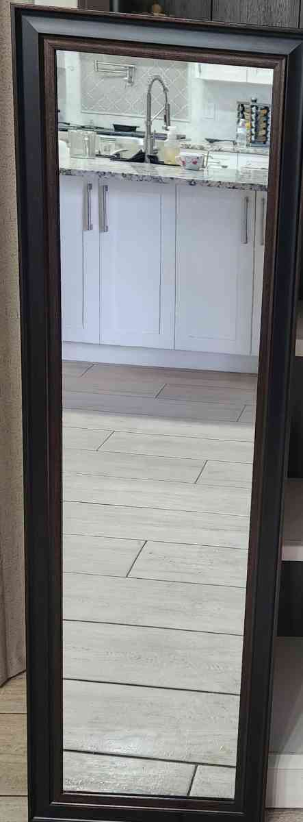 the mirrow is the puor wood the measures of height is 54 the