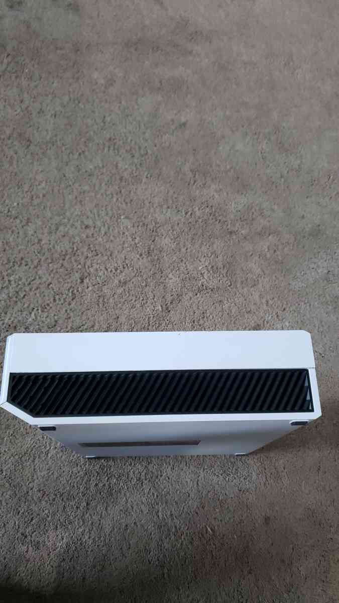 Xbox one with a wired controller and 3 games for the console