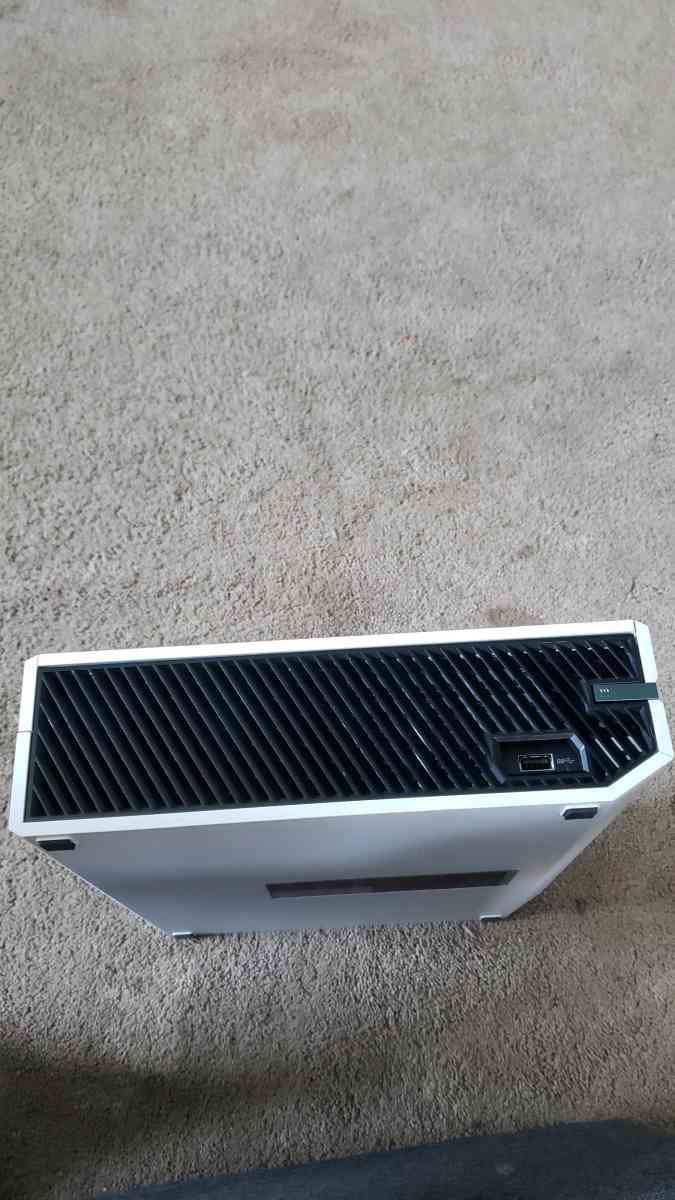 Xbox one with a wired controller and 3 games for the console