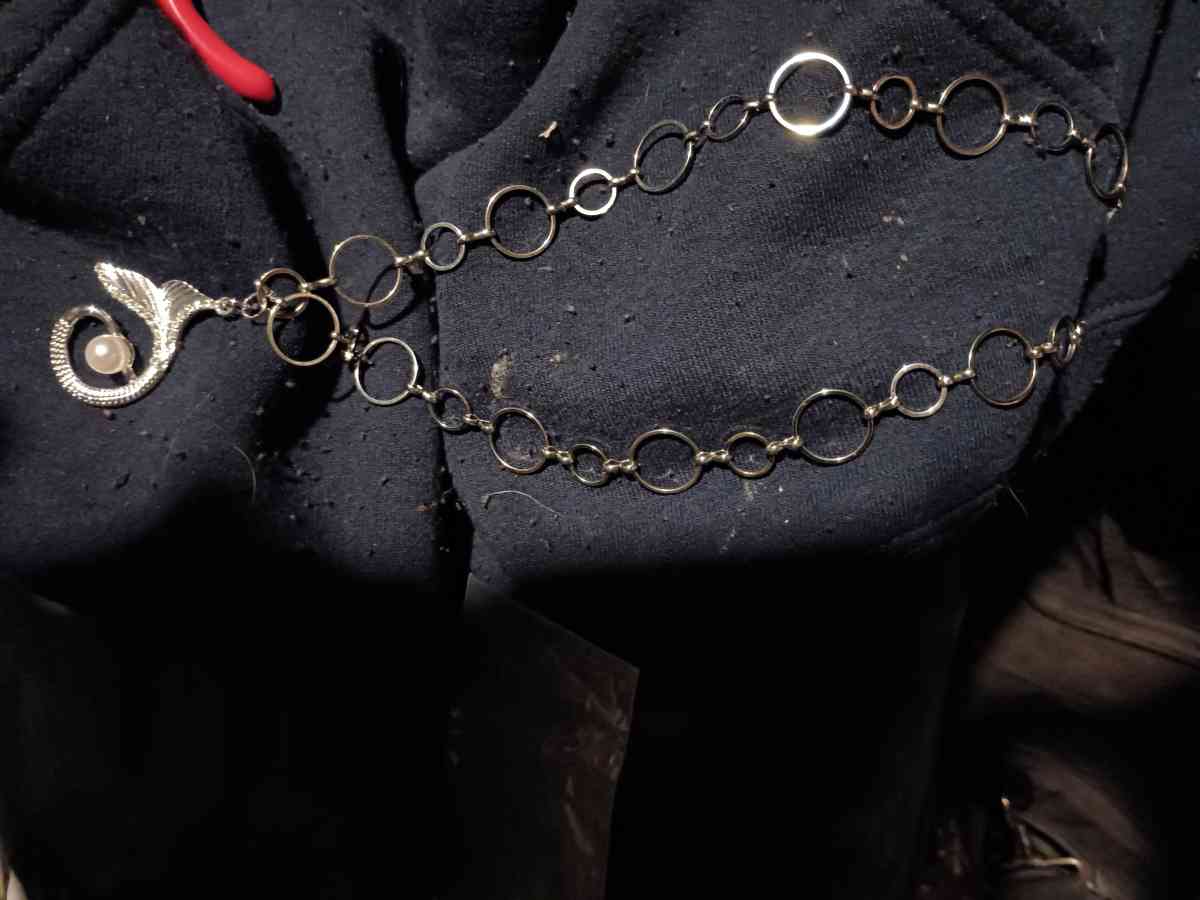 silver with a pendant and pear