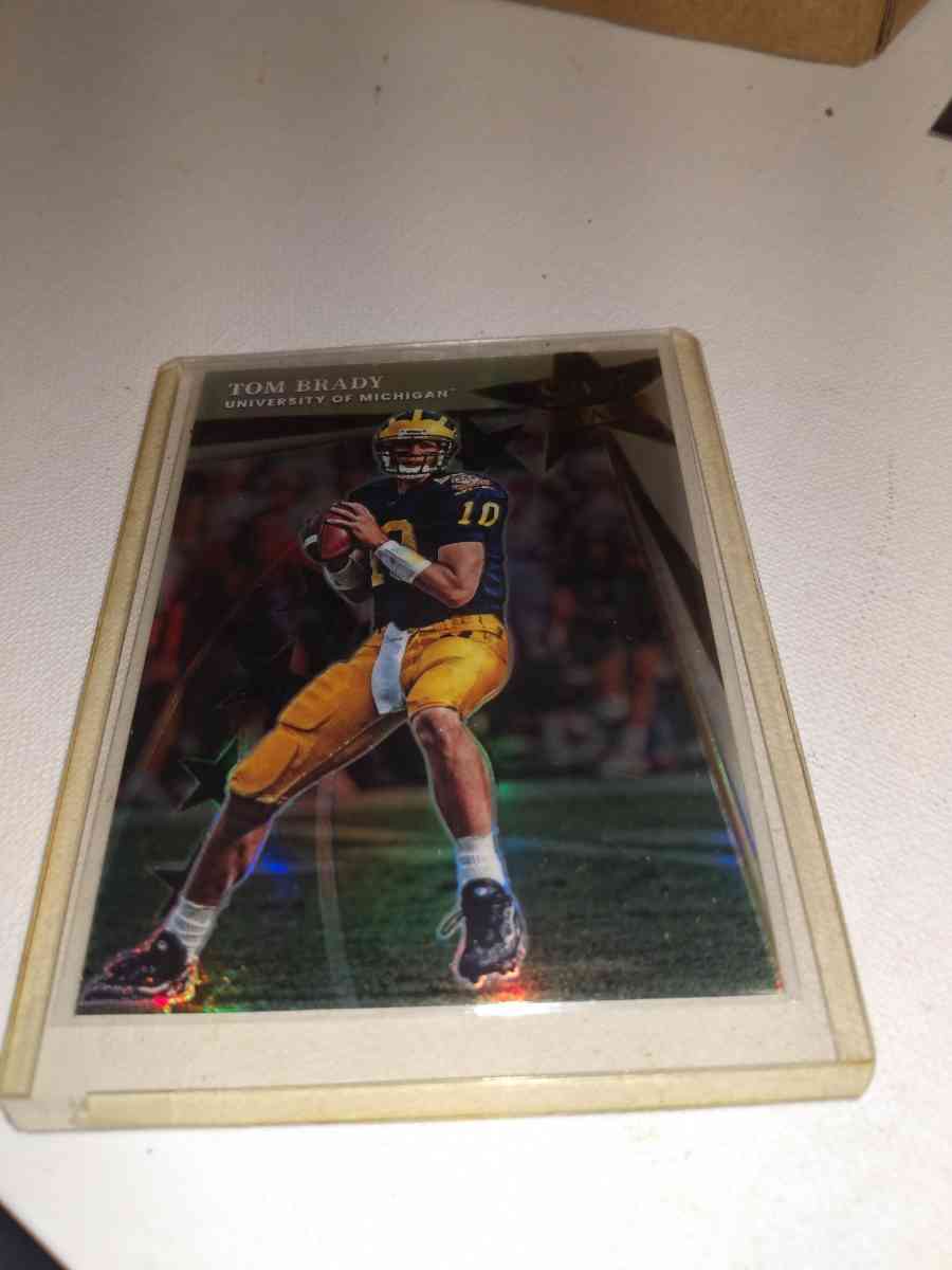 2022 select Tom Brady and his college uniform