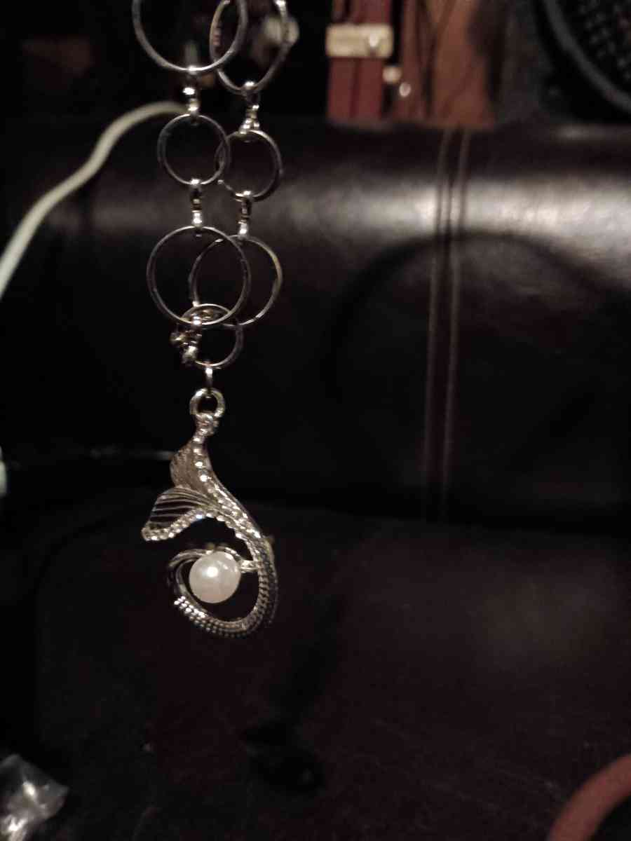 silver with a pendant and pear