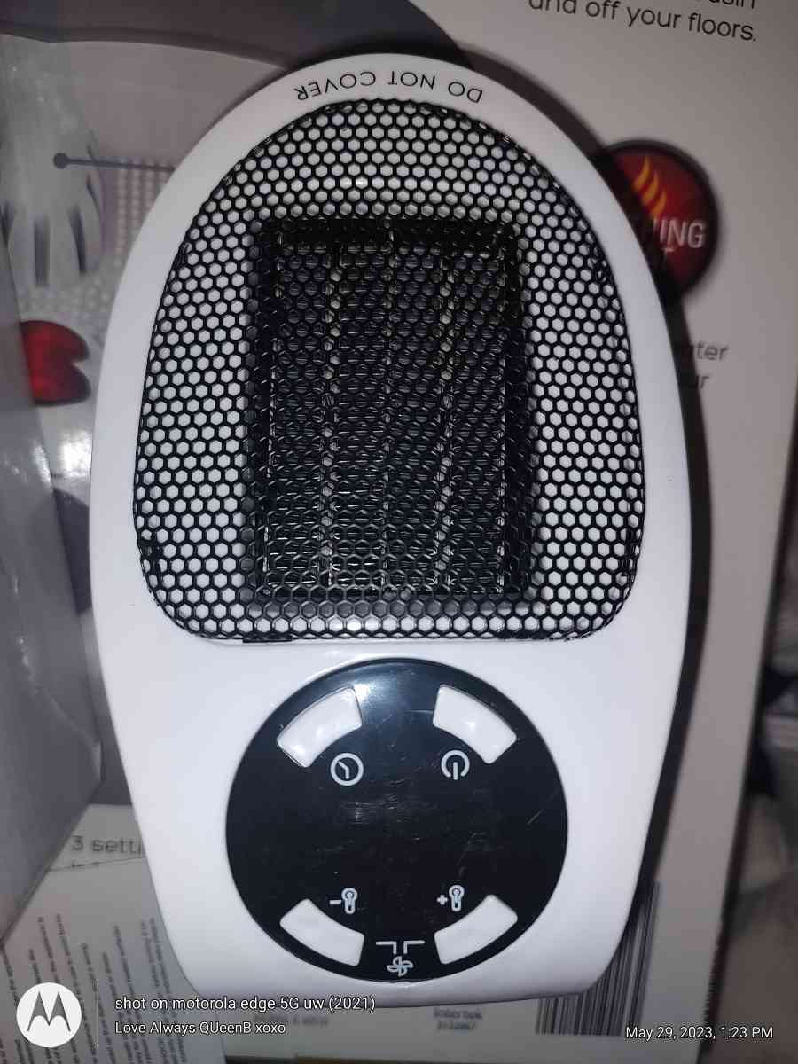 4 brand new portable plug in new heaters still in box