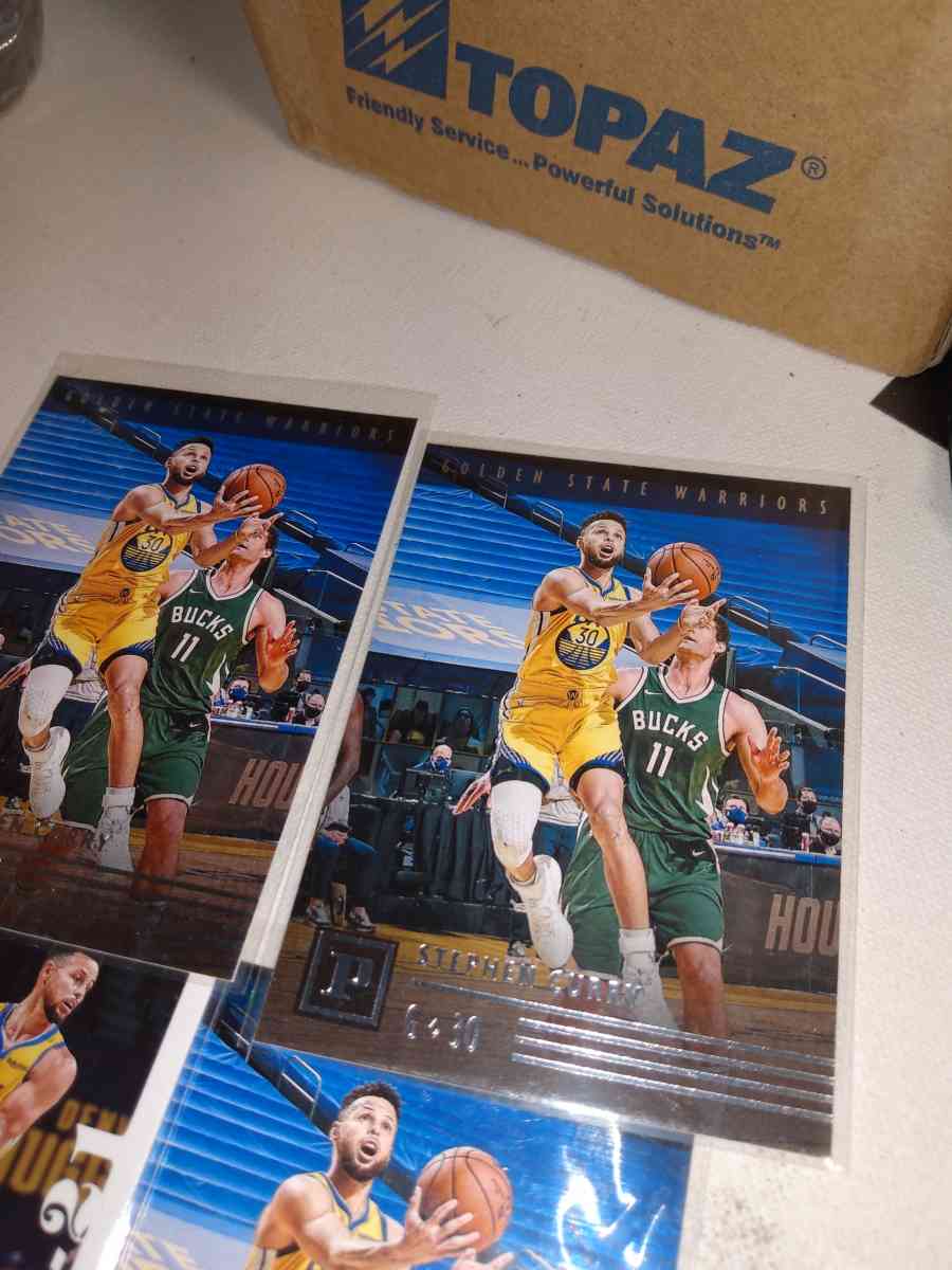 four card lot of Stephen Curry