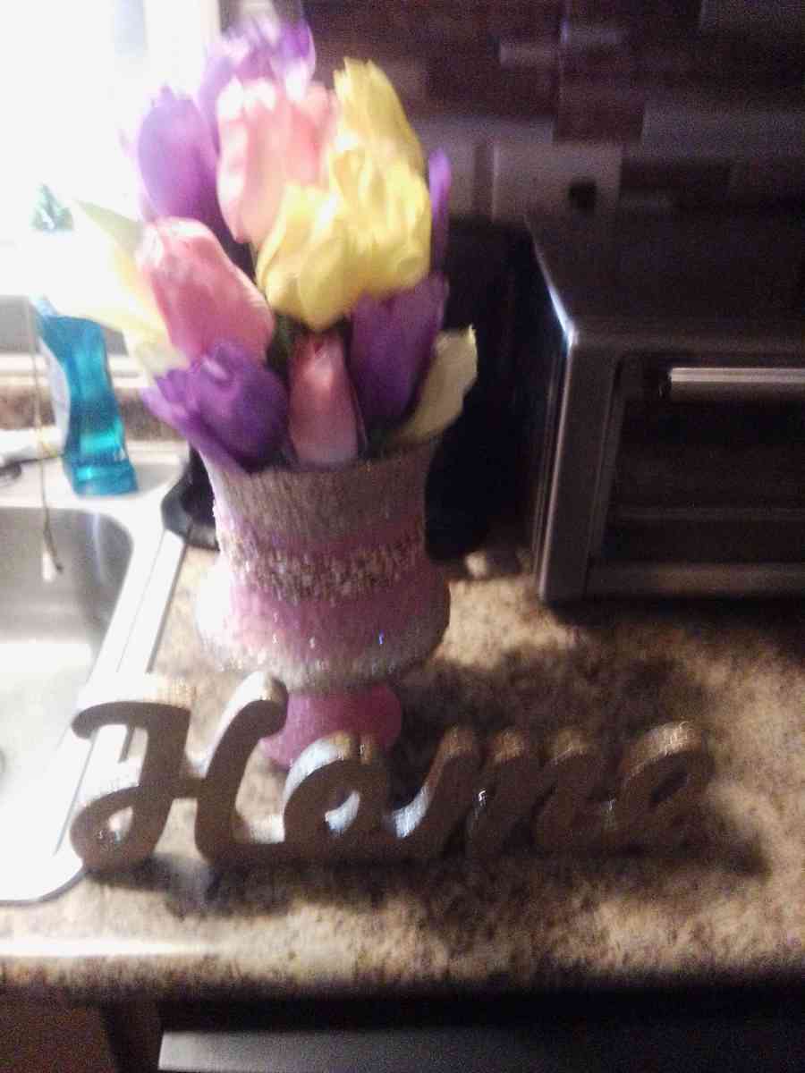 floral arrangement and home sign