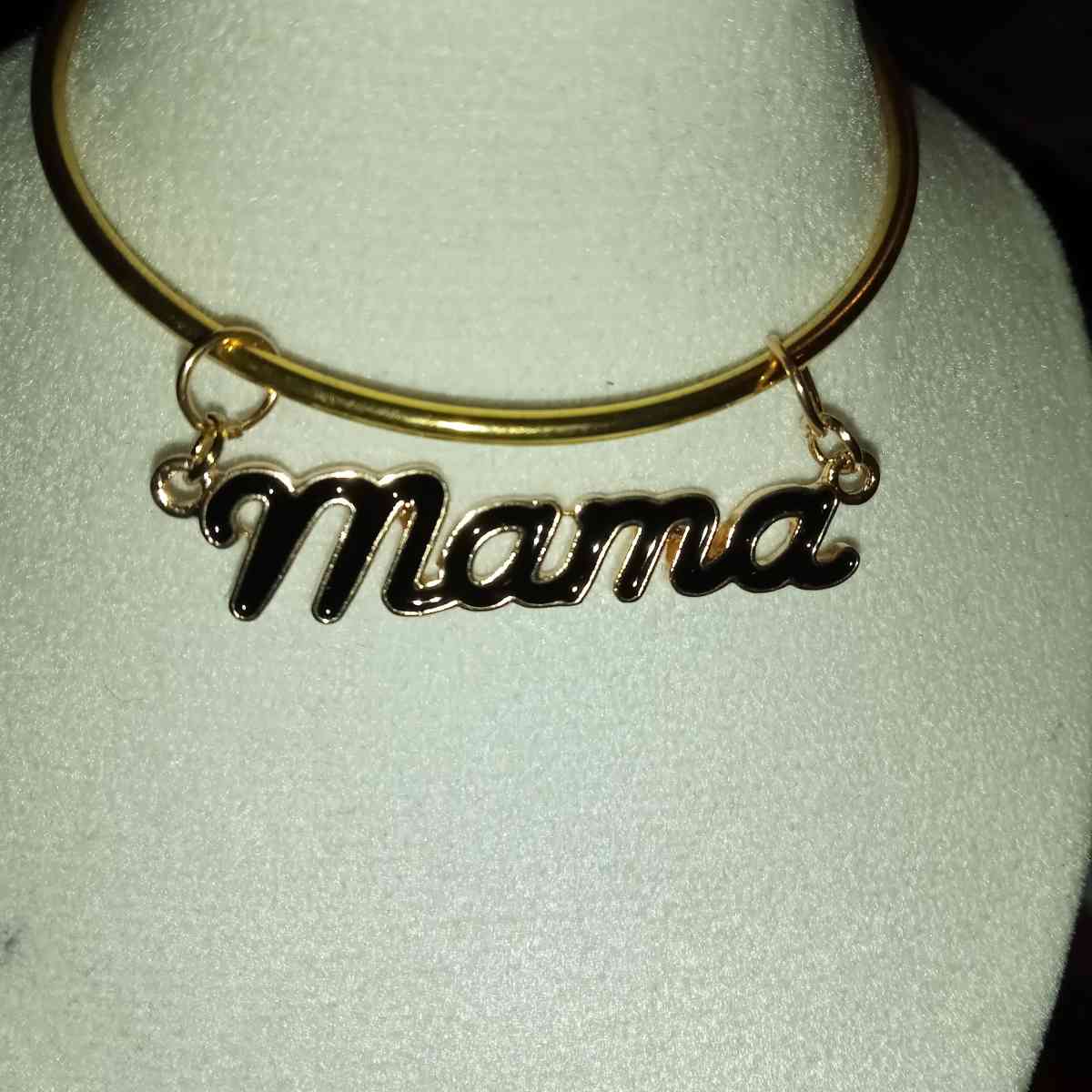 mama charm on a bangle bracelet