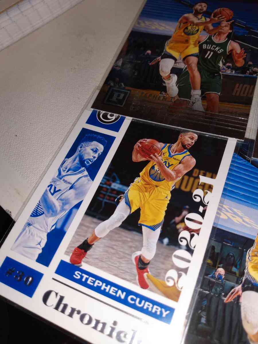 four card lot of Stephen Curry