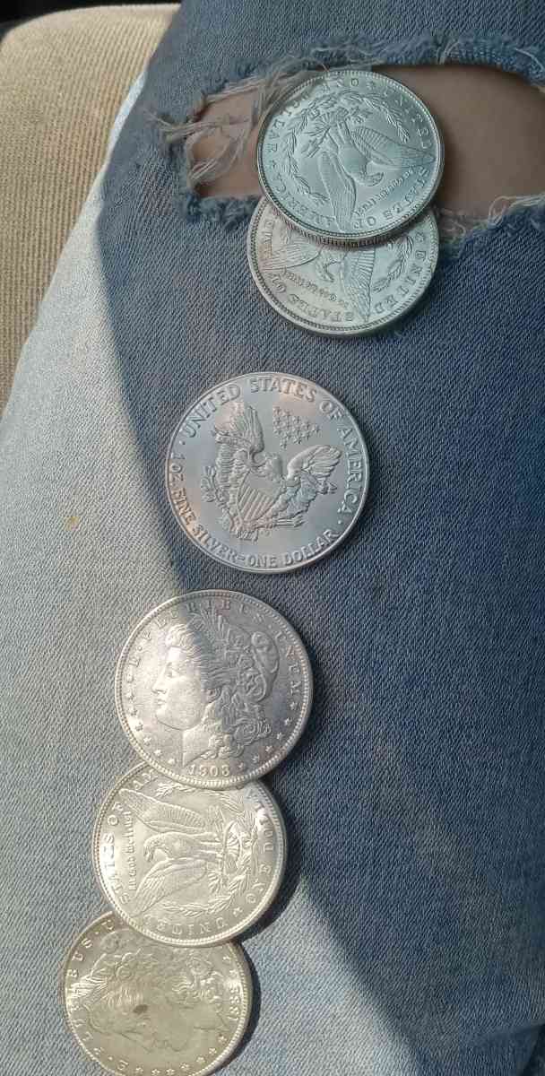 6 fine silver dollars