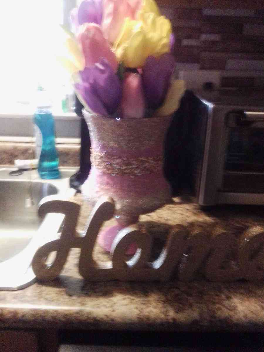 floral arrangement and home sign