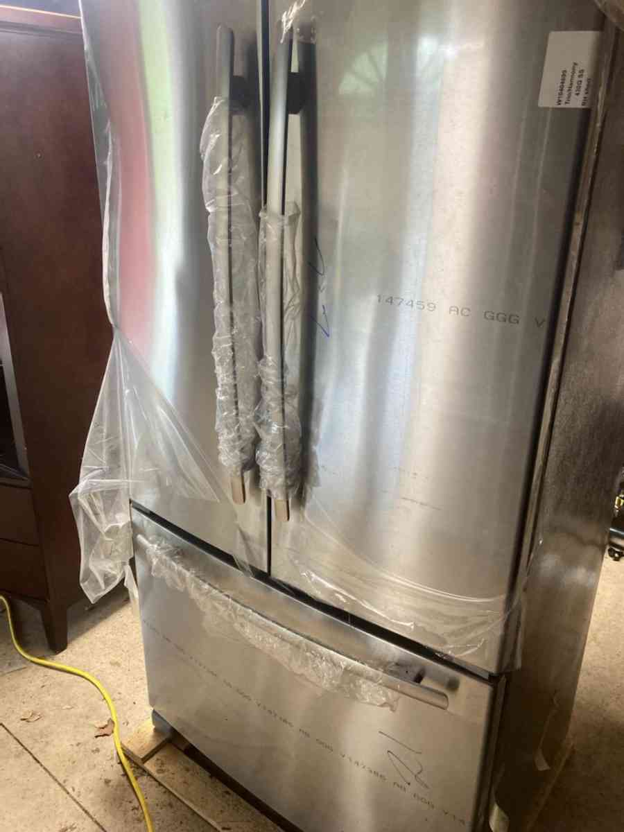 KitchenAid refrigerator with small dent brand new