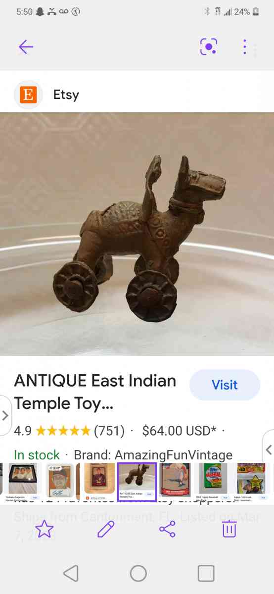 childs iron Play stove with all of the pans and a brass toy