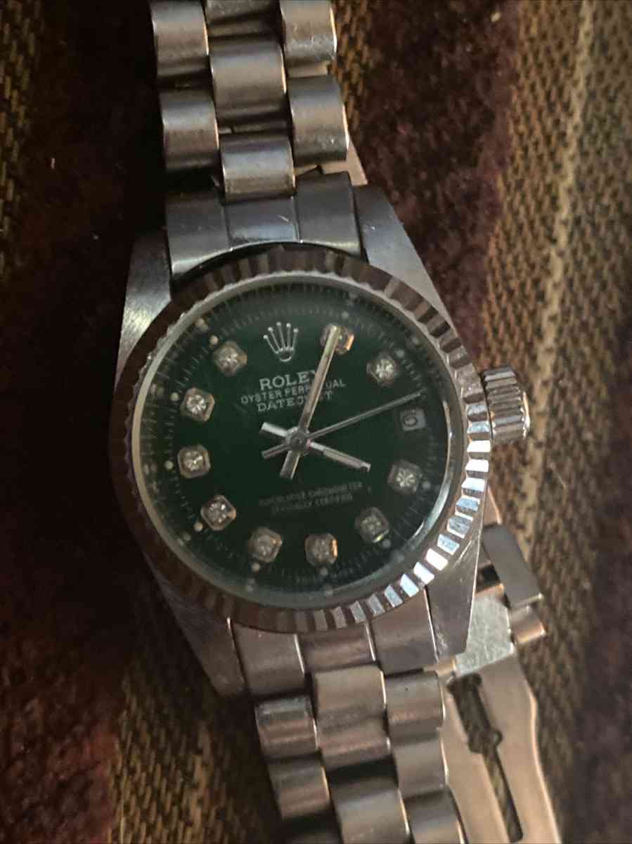 oyster perpetual datejust 18 karat white gold Rolex