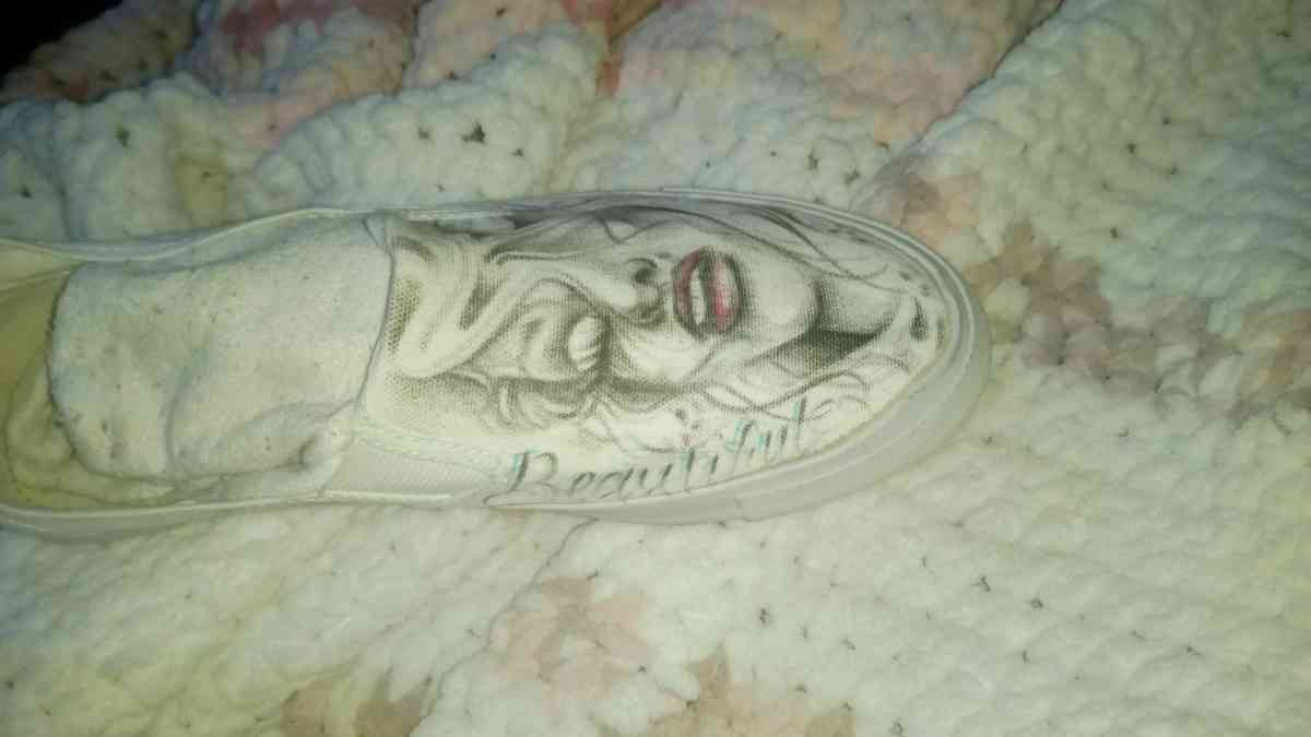 shoes with prison art drawn on them by the homeboy Jhonny m