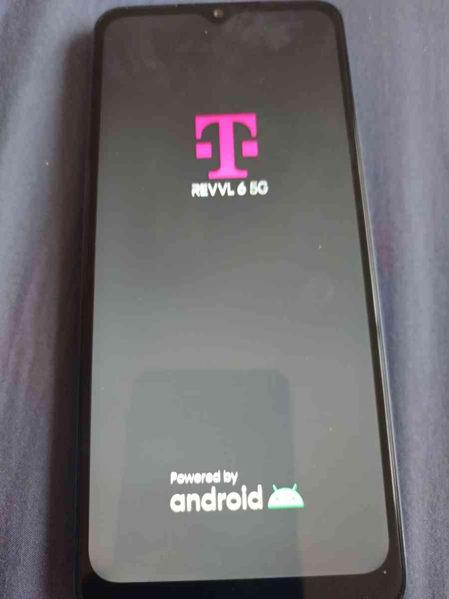 TMobile revvl 6 5G cellphone with charger cord and protector