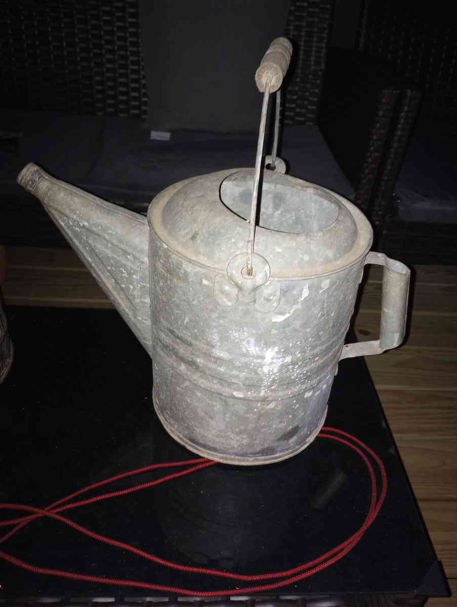 antique water can
