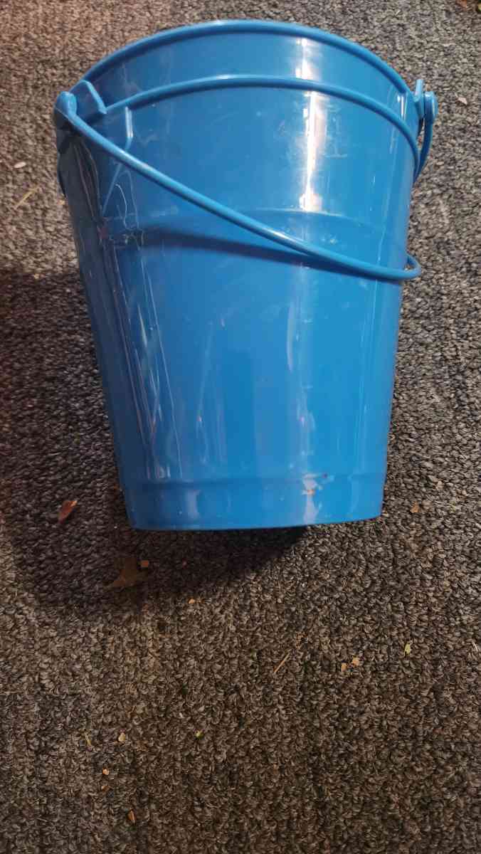 Small blue buckets perfect for pens on the desk