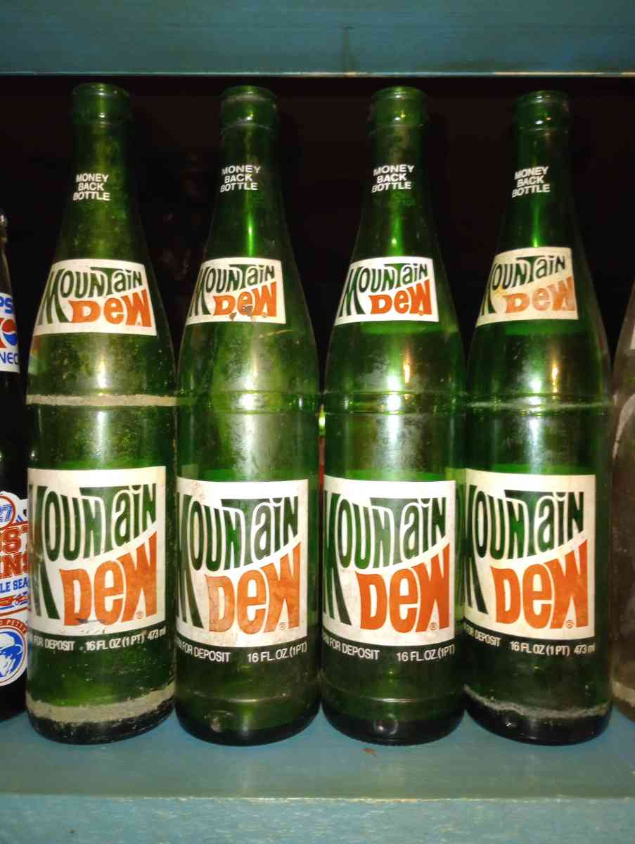 set of 4 mountain dew bottles