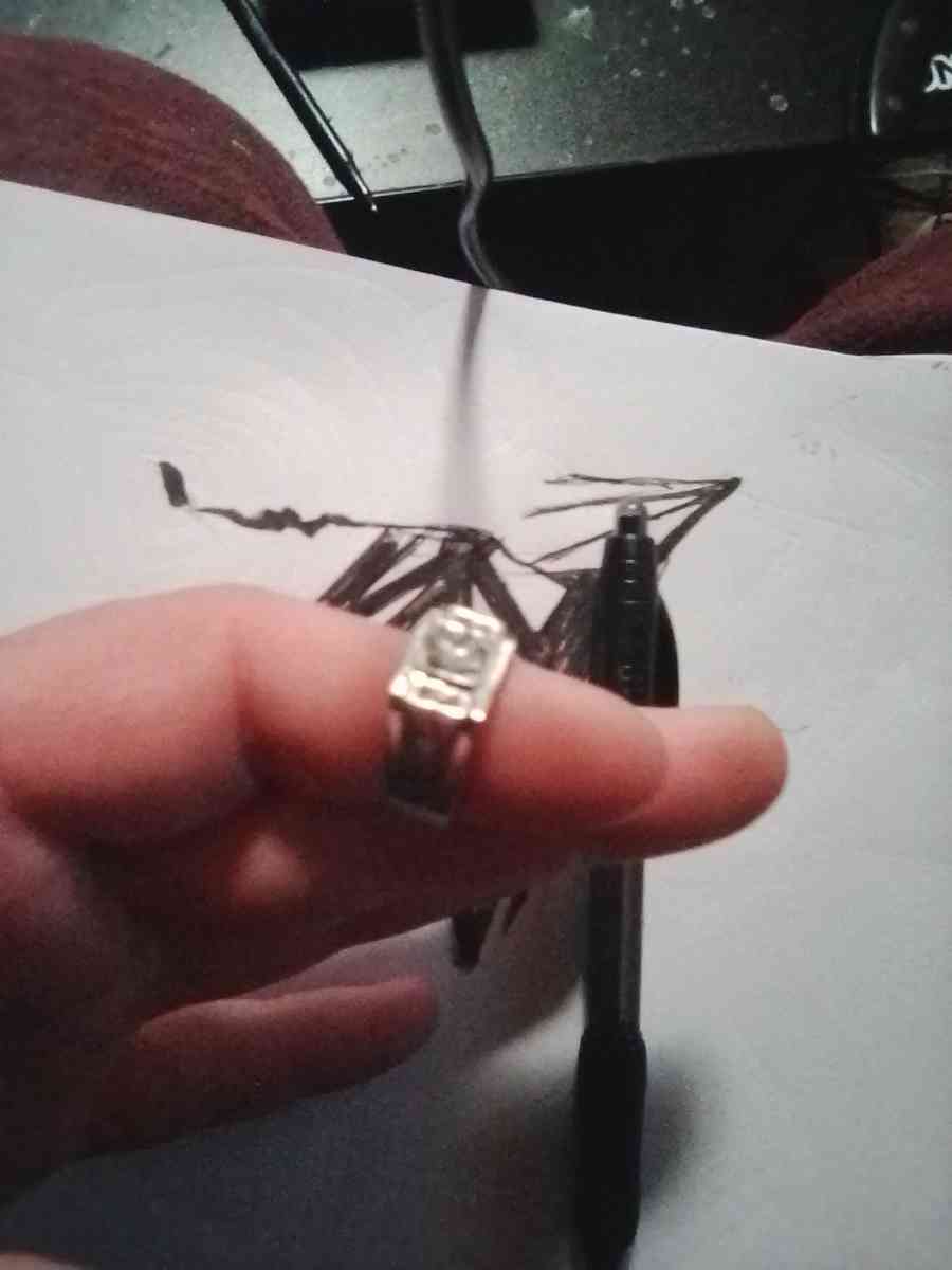 antique 1 platinum diamonds and 1 silver ruby rings