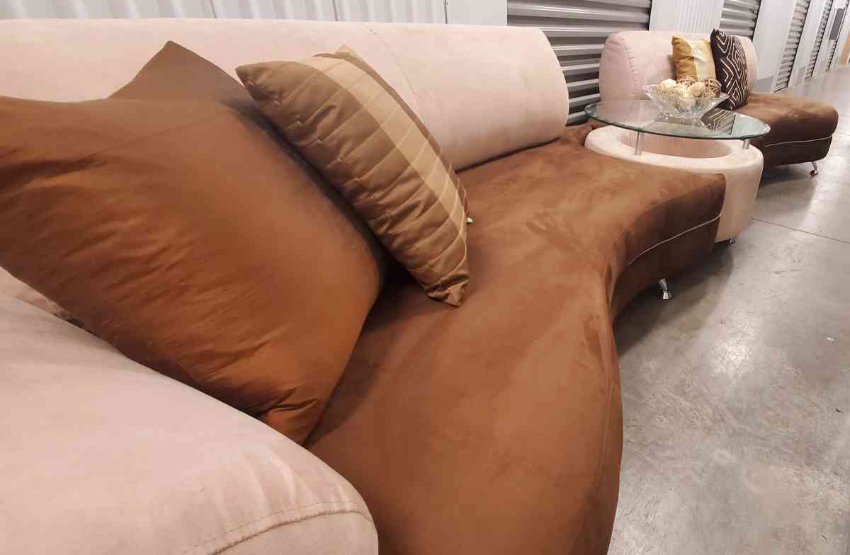 2 long curved sofas with matching table