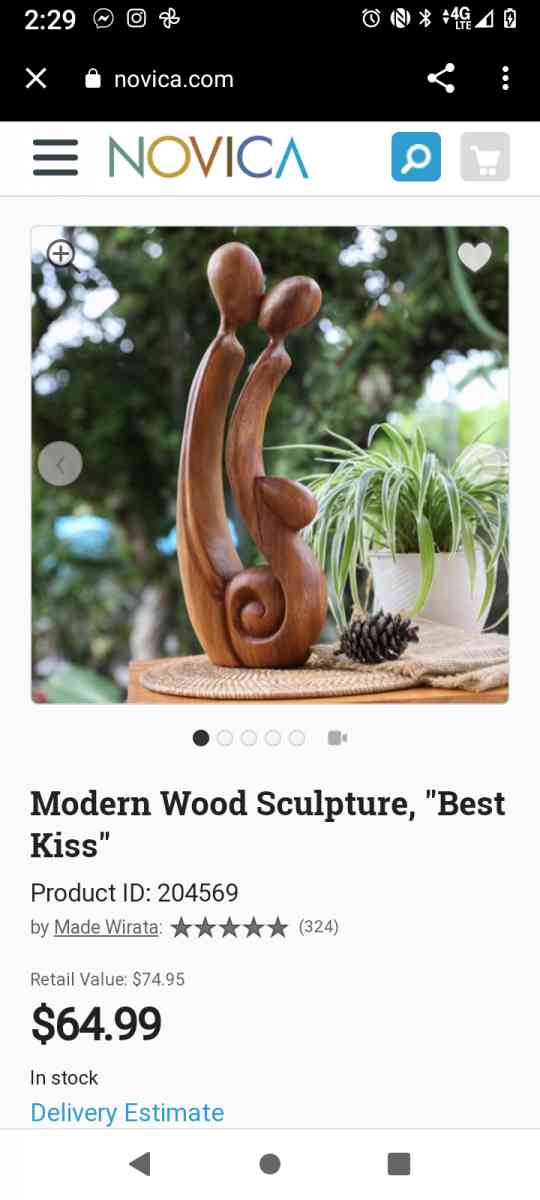 wood sculpture man  woman kissing