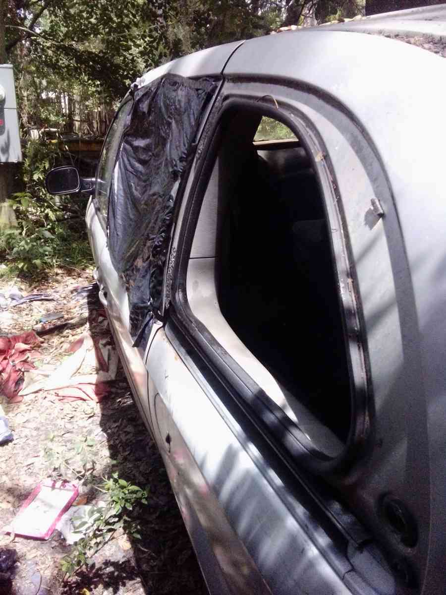 the 2003 Chrysler minivan Voyager for sale needs a little wo