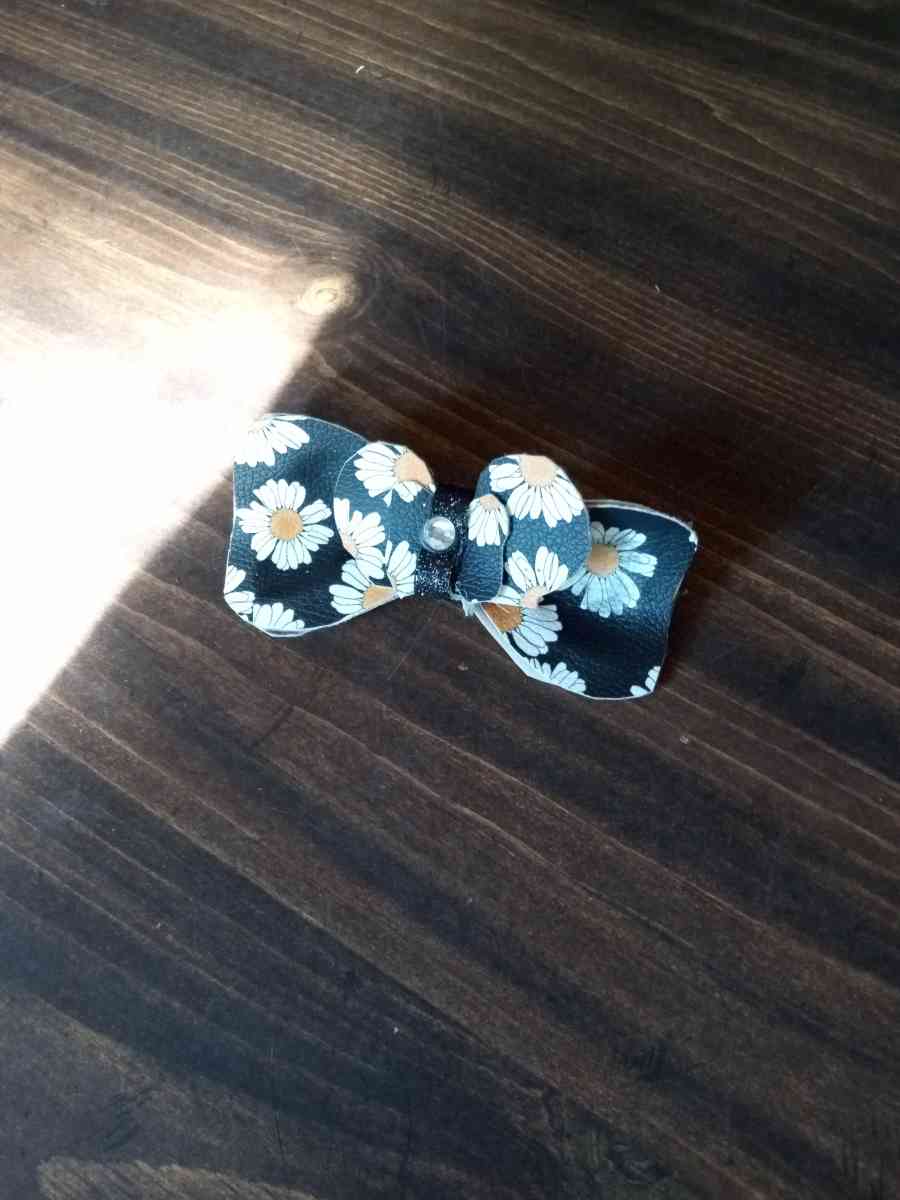 ribbon and fabric and leather hair or gift bows