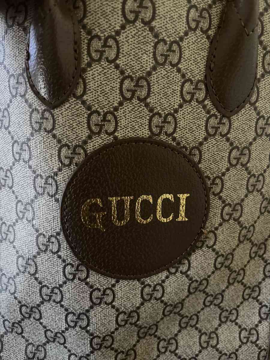 Gucci hand held purse