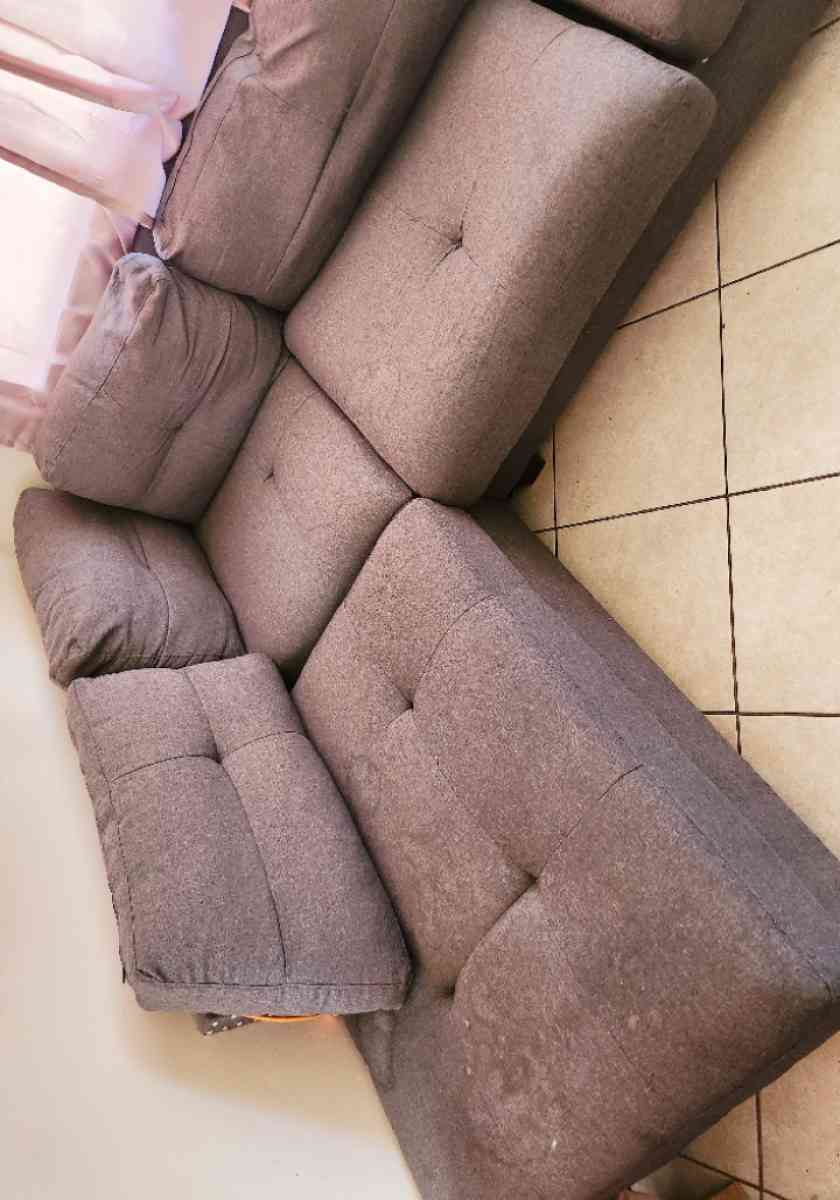 Grey sectional sofa with ottoman