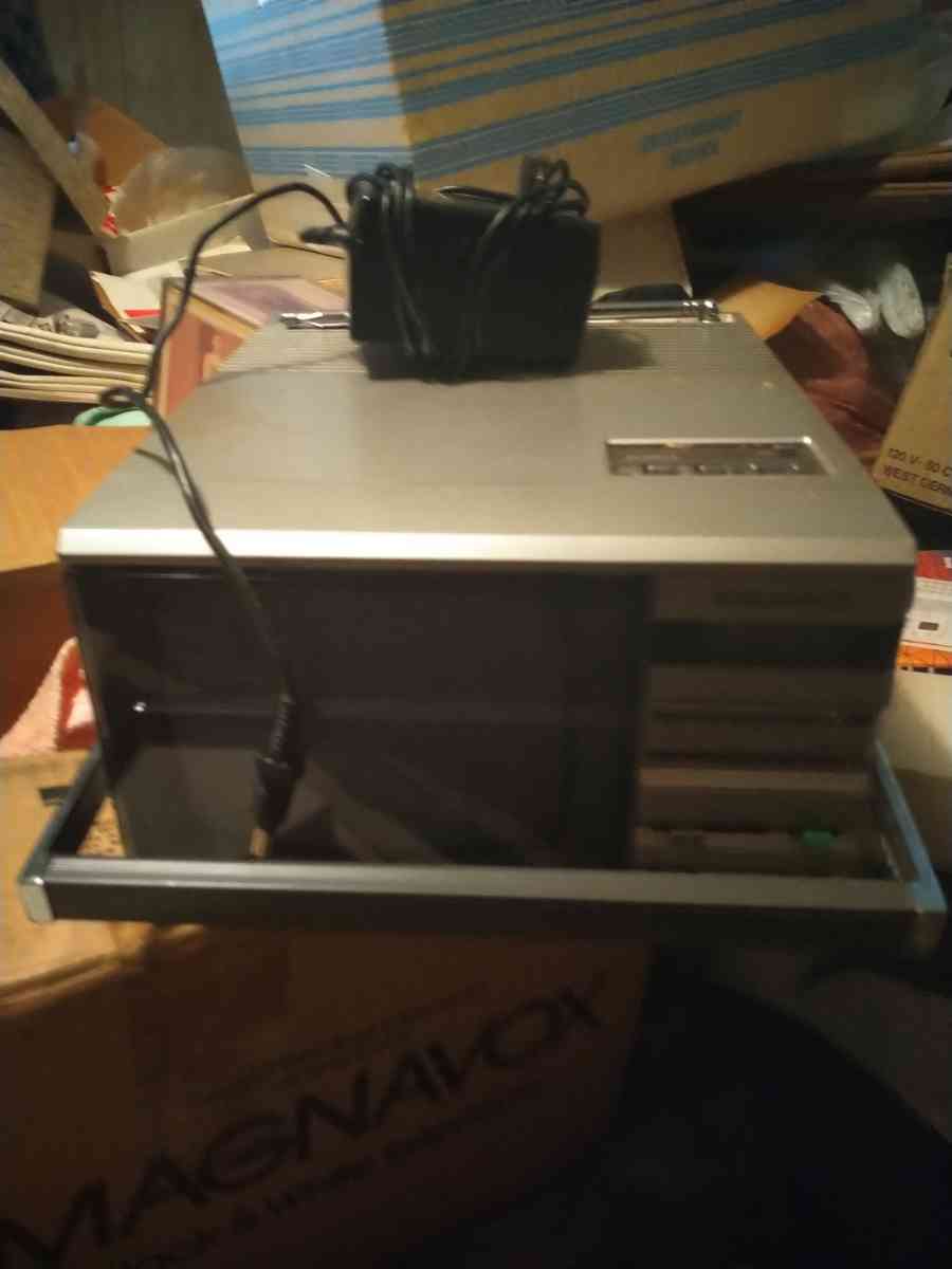 vintage but new never used portable Magnavox TV with cord