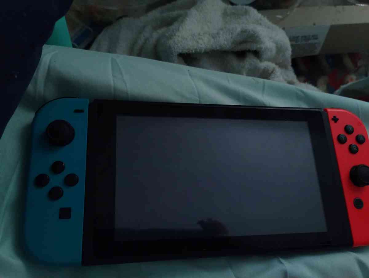 Nintendo switch neon red and blue and accessories